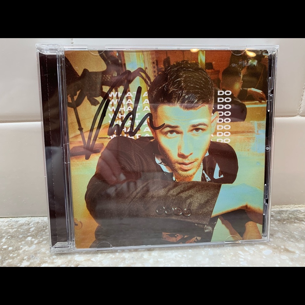 Nick Jonas Autographed “What A Man Gotta Do” Single CD
